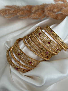 Gold imitation bangles stack