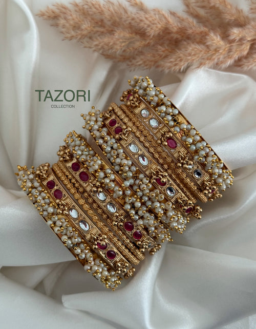 Kundan x Pearl bangles stack