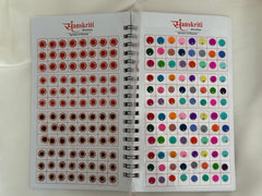 Sanskritt color swatch book with red and multicolor dots on a white background