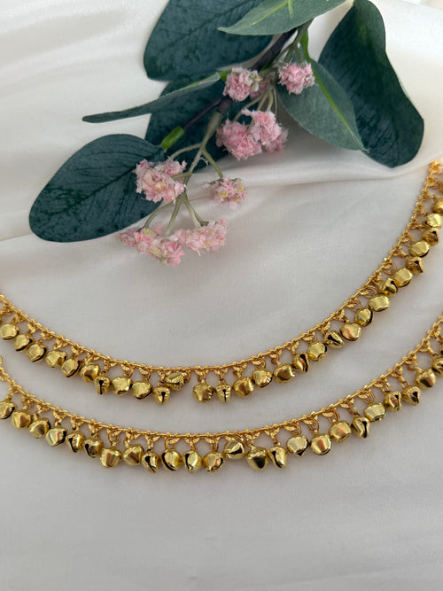 Gold anklets with bells