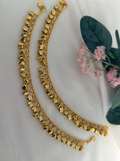 Gold anklets with bells