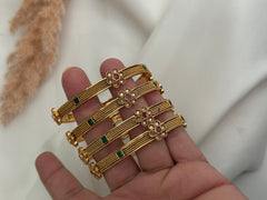 Gold gold imitation bangles Set of 4