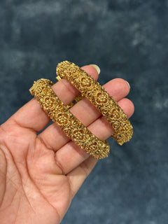 Gold imitation bangles set