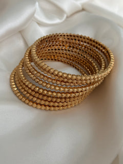 Gold imitation 8 bangles set