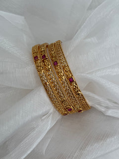 Gold imitation bangles set