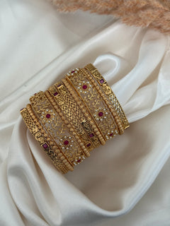 Gold imitation bangles stack