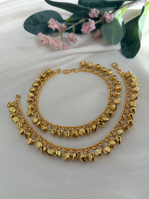 Gold anklets with bells
