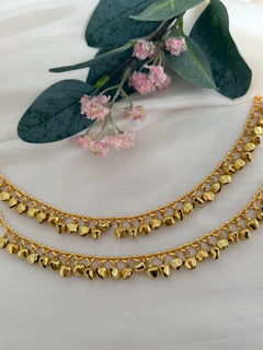 Gold anklets with bells