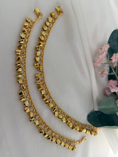 Gold anklets with bells