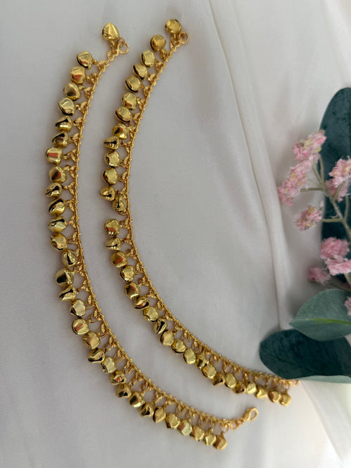 Gold anklets with bells