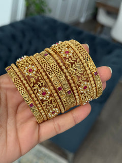 Gold imitation bangles stack
