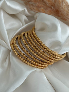 Gold imitation 8 bangles set