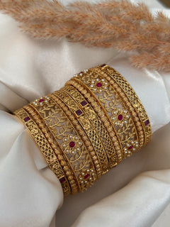 Gold imitation bangles stack