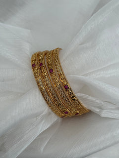 Gold imitation bangles set