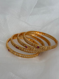 Gold imitation bangles set