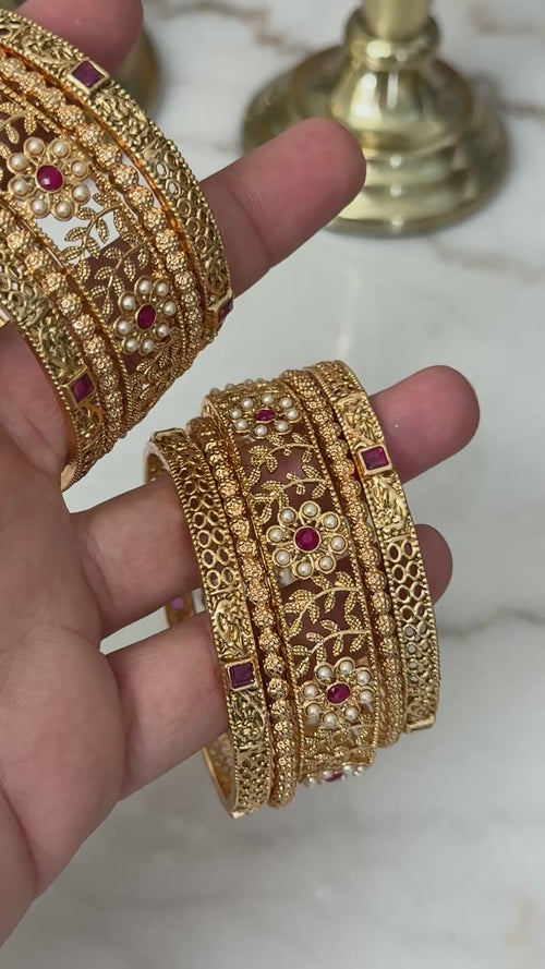 Gold imitation bangles stack