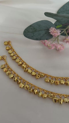 Gold anklets with bells