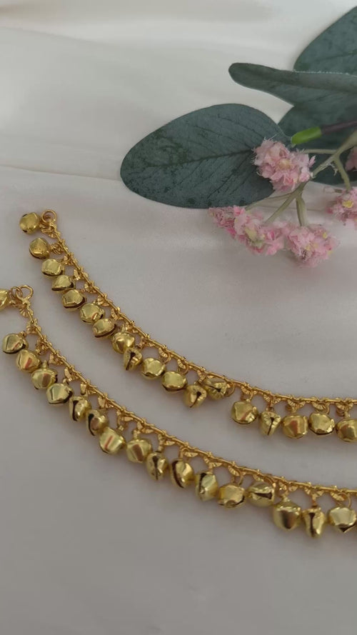 Gold anklets with bells